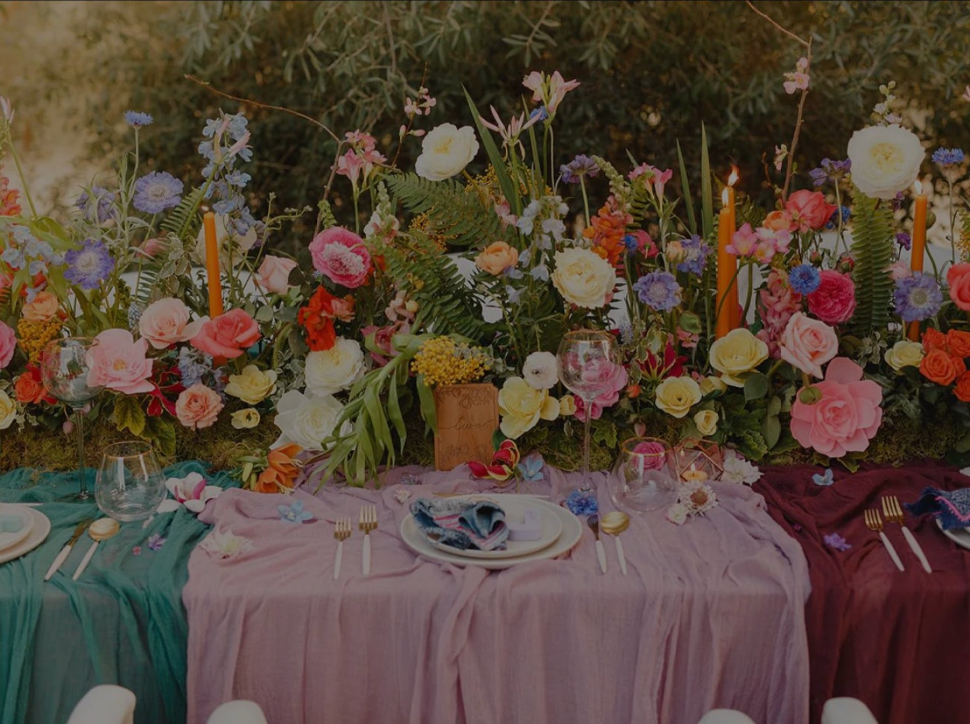 Garden party table with colorful flowers